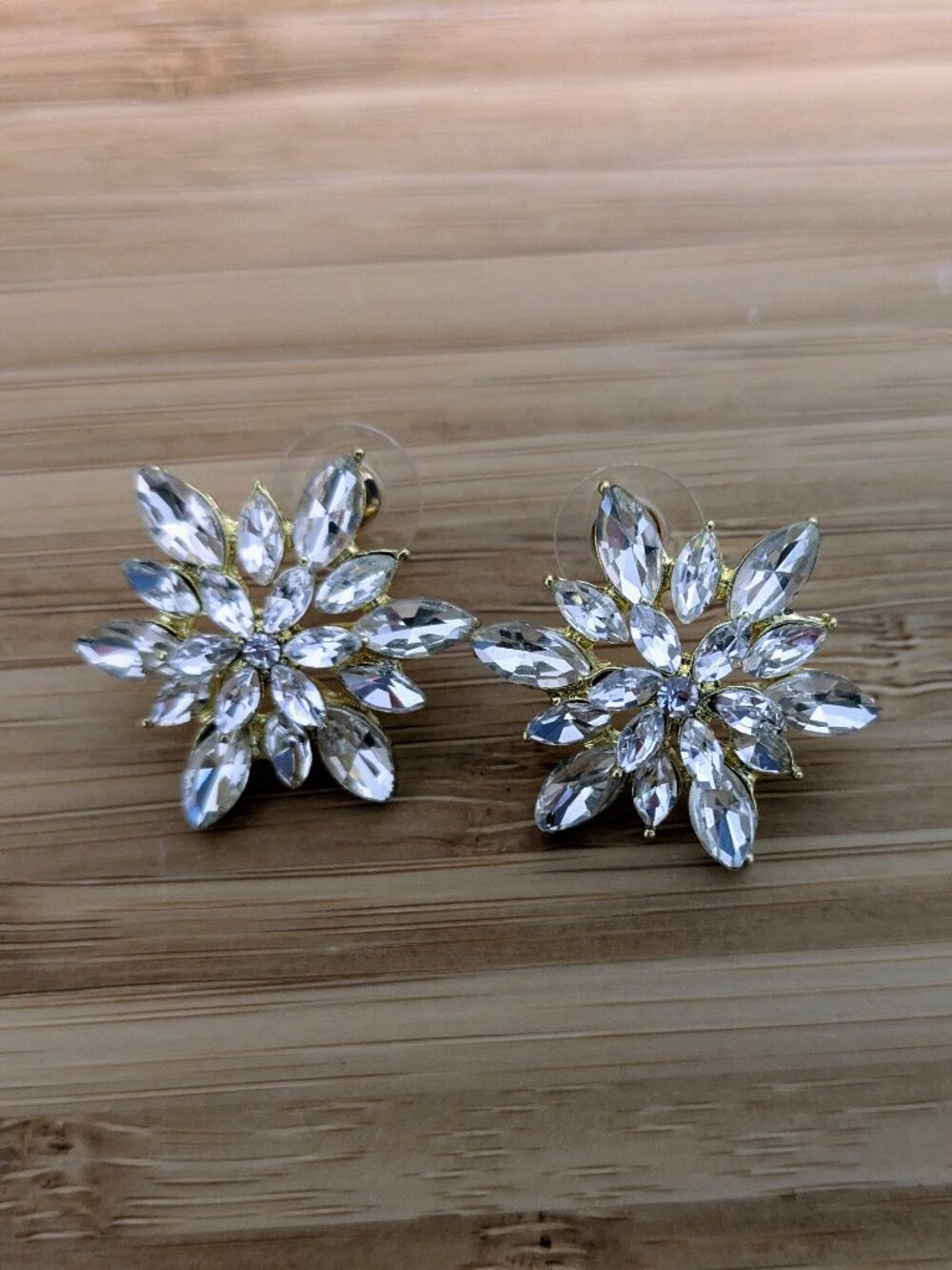 Gold Tone Rhinestone Snowflake Earrings